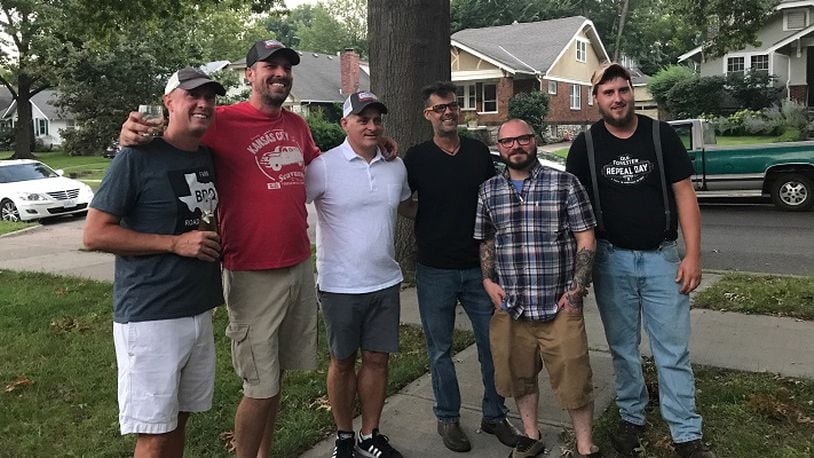 Mitch Benjamin, left, of the award-winning Meat Mitch competitive barbecue team, and team member Bruce Trecek, third from left, shared competition barbecue tips with local chefs Charles d'Ablaing, Michael Foust of The Farmhouse, Vaughn Good and chef de cuisine Jamie Everett of Hank Charcuterie in Lawrence, Kan., on August 17, 2017. (Jill Wendholt Silva/Kansas City Star/TNS)