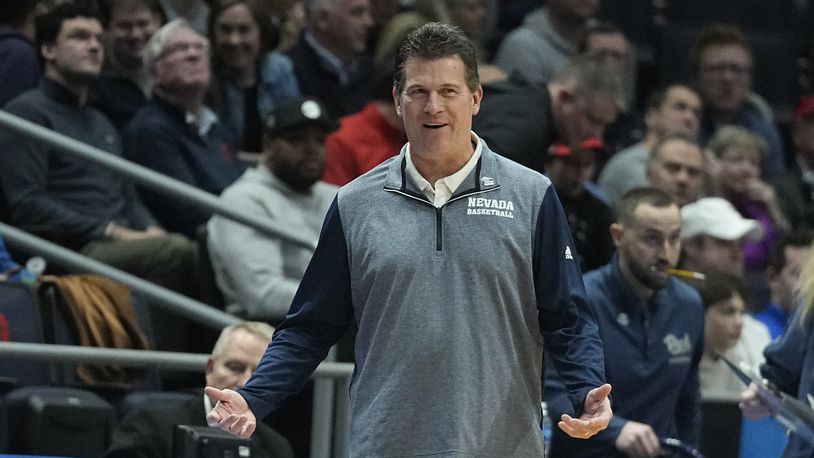 Nevada head coach Steve Alford questions a call during the first half of a First Four college basketball game against Arizona State in the NCAA men's basketball tournament, Wednesday, March 15, 2023, in Dayton, Ohio. (AP Photo/Darron Cummings)