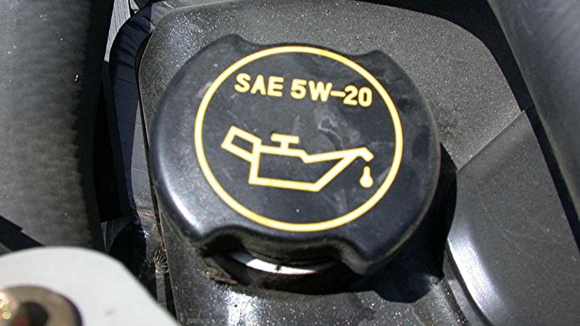 The viscosity of engine oil is often printed on the oil fill cap. James Halderman photo