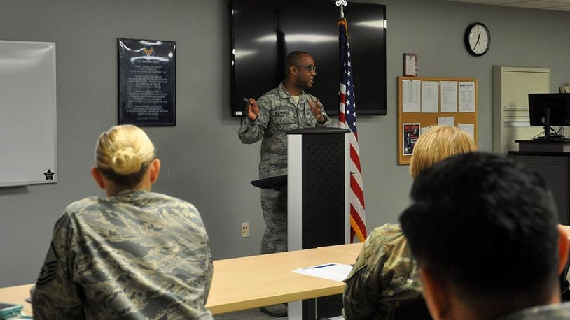 Master Sgt. Kevin Alexander, Mission Support superintendent, Air Force Office of Special Investigations, who is Toastmasters area director, evaluates a speaker during a club meeting on Wright-Patterson Air Force Base June 4. The Wright Way Toastmasters meet every first and third Tuesday of the month at noon in the Wright-Patterson Medical Center. (U.S. Air Force photo/Karina Brady)