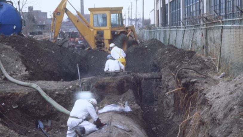 Hamilton, joined by state officials in the 1970s and 1980s, had to battle in court for the cleanup and continued monitoring of the former Chem-Dyne chemical-processing Superfund site at 500 Joe Nuxhall Boulevard, formerly Ford Boulevard. This photo shows cleanup happening there in December of 1981. Monitoring of comination of the aquifer continues. PROVIDED