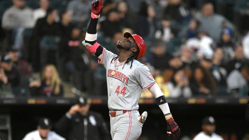 Cincinnati Reds' Elly De La Cruz (44) celebrates at home plate after hitting a three-run home run during the third inning of a baseball game against the Chicago White Sox Friday, April 12, 2024, in Chicago. (AP Photo/Paul Beaty)