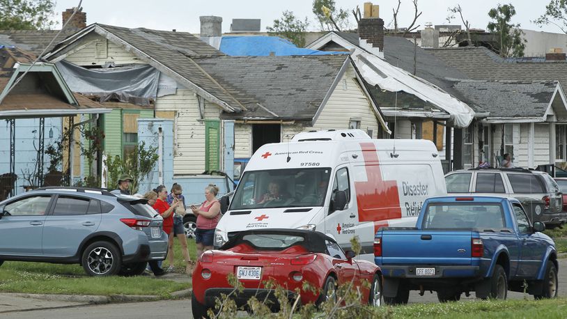 Red Cross Disaster Relief truck is parked along a tornado ravaged Macready Avenue. TY GREENLEES / STAFF
