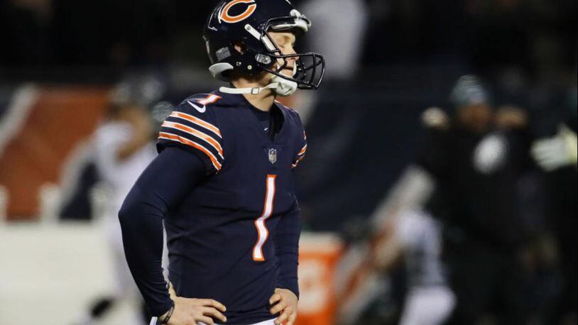 Chicago Bears kicker Cody Parkey watches in disbelief as his field goal attempt bounces off the upright and crossbar during Sunday's playoff game.