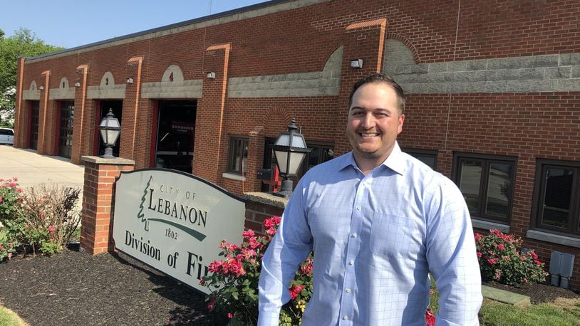 Ryan Powers stands in front of the Lebanon fire station he wants to redevelop as offices, meeting rooms, shared-working areas. Powers also talked of leasing part of the building to a brewpub or restaurant. STAFF/LAWRENCE BUDD
