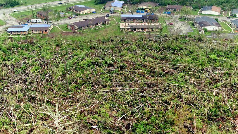 Wooded area between the Foxton Apartments on Shoop Mill Road and the Stillwater River was flattened by the tornado on Memorial Day.  TY GREENLEES / STAFF