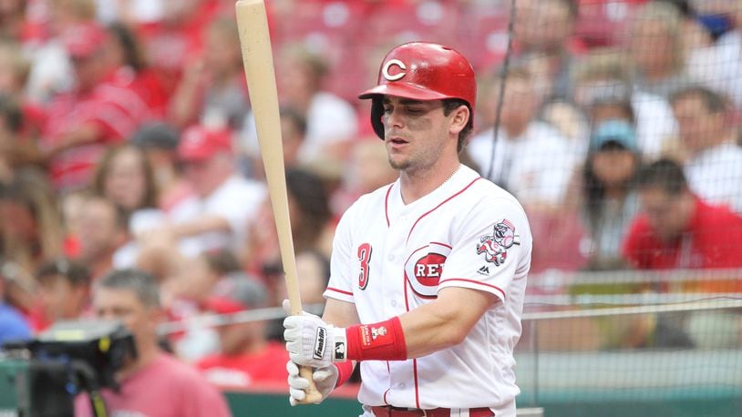 The Reds Scooter Gennett prepares to bat against the Rockies on Tuesday, June 5, 2018, at Great American Ball Park in Cincinnati. David Jablonski/Staff