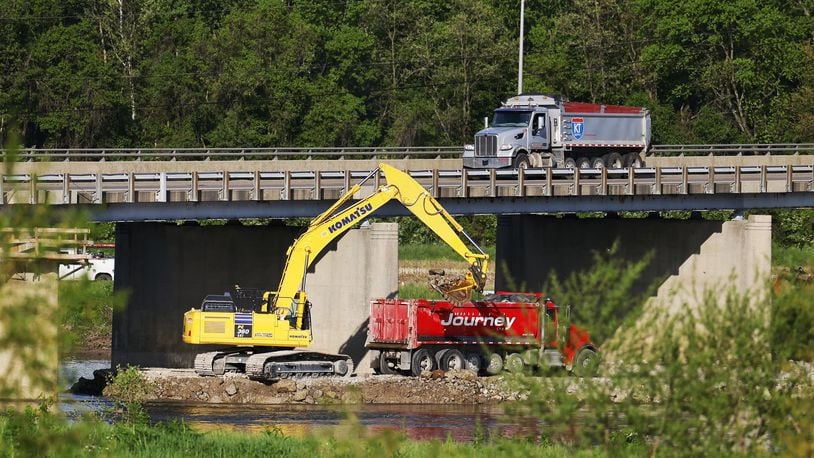 Workers are preparing the Ohio 122 bridge over the Great Miami River for construction set to begin Monday. The bridge that connects Middletown to Madison Twp. will be closed for 45 days, according to the Ohio Department of Transportation. NICK GRAHAM/STAFF