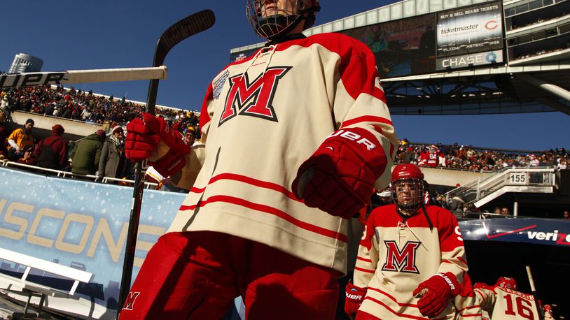 Miami University’s hockey team played the first outdoor game in school history in 2013 during the inaugural Hockey City Classic at Soldier Field in Chicago. The event drew a crowd of 52,051, which saw Notre Dame defeat the RedHawks, 2-1, in the first game of a doubleheader. FILE PHOTO