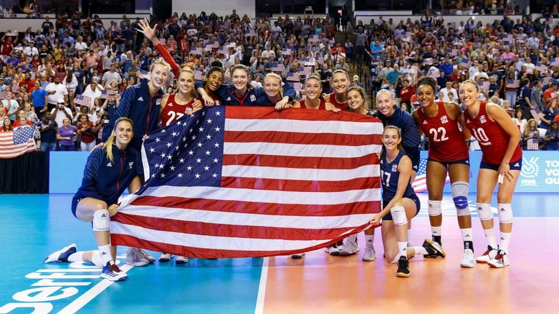 Alter High School grad Megan Courtney (right, kneeling) joins the U.S. women’s national volleyball team in celebration of qualifying for the 2020 Summer Olympic Games at Tokyo. FIVB PHOTO