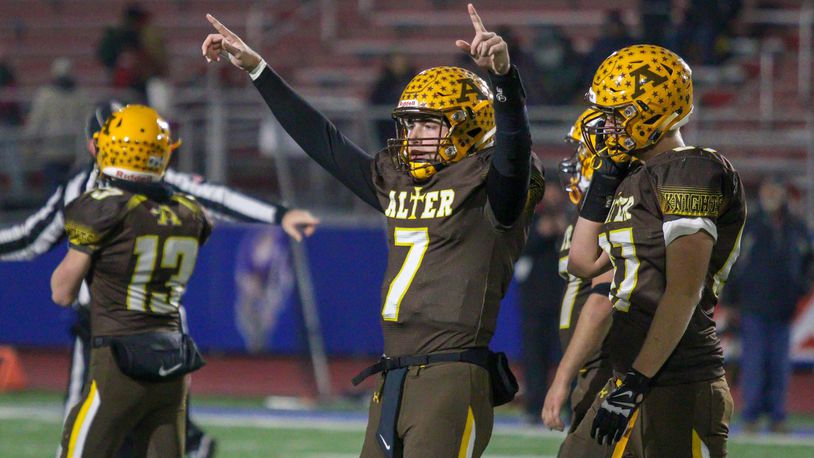 Alter High School Connor Bazelak celebrates immediately after the Knights won the Division III, Region 12 championship, beating Wapakoneta 21-7 on Friday night at Piqua High School’s Alexander Stadium. CONTRIBUTED PHOTO BY MICHAEL COOPER