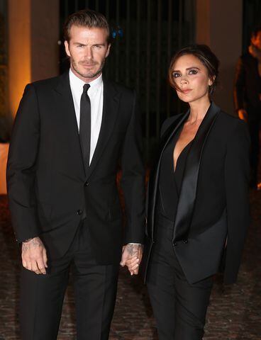 Victoria and David Beckham's sons Brooklyn and Romeo. Victoria Beckham is the godmother of...