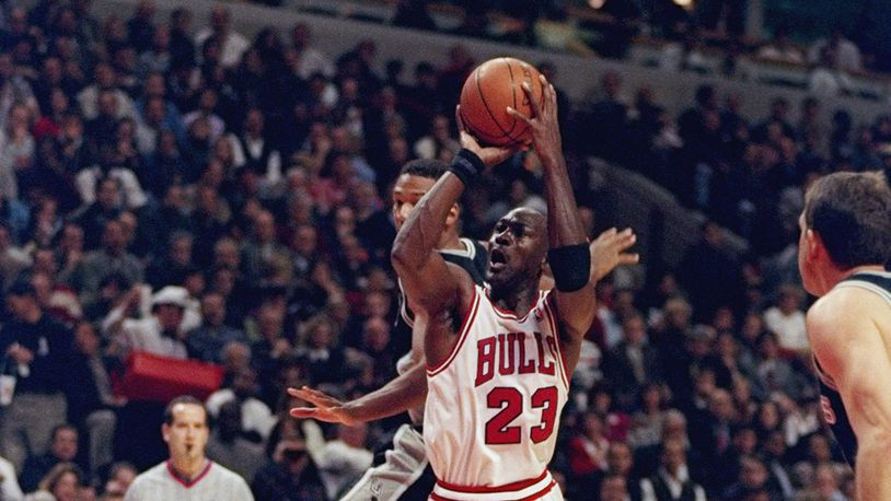 Michael Jordan pictured in 1997 during a game against the San Antonio Spurs at the United Center in Chicago. ESPN Films and Netflix are releasing a documentary on Jordan next year. (Photo by Jonathan Daniel/Allsport)
