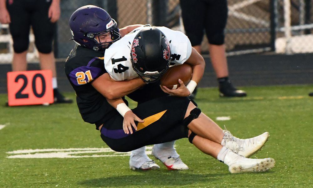 Bellbrook's Jonah Atchison tackles Franklin's Drew Isaacs during their game at Bellbrook on Friday, Sept. 4, 2020. Nick Falzerano/CONTRIBUTED