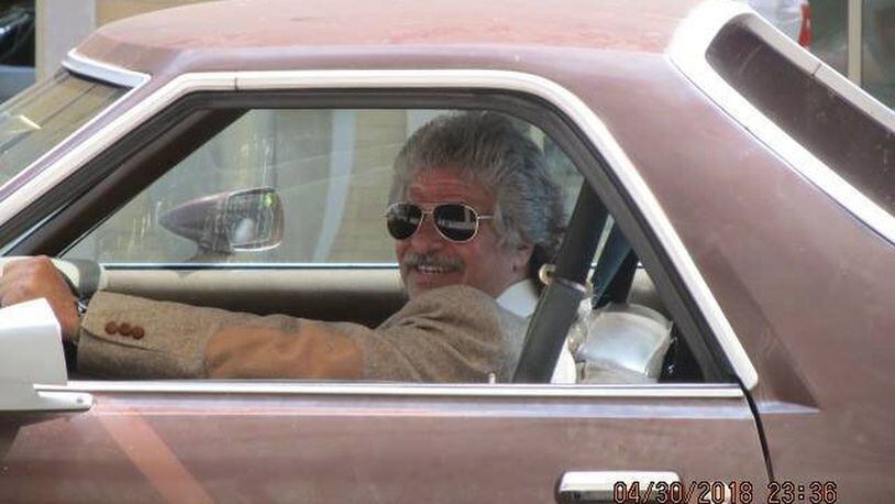 Scott Walker worked May 1 as an extra to drive a car in downtown Dayton during the filming of the ‘Old Man and the Gun,’ starring Academy award winners Robert Redford and Casey Affleck. Amelia Robinson photo