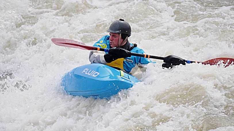 Charles Middlestetter of Brookville kayaks on the Great Miami River in Dayton on Monday, March 13, 2017. MARSHALL GORBY / STAFF
