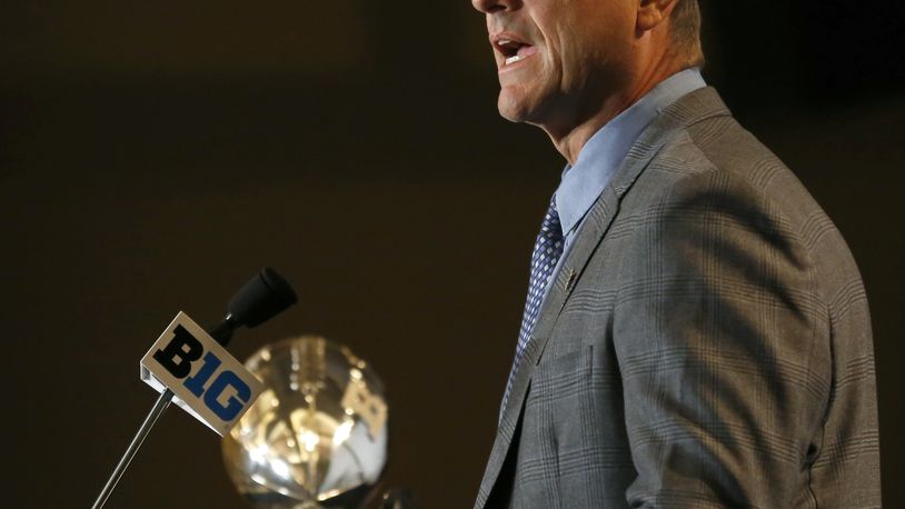 Michigan head coach Jim Harbaugh speaks to the media at the Big Ten NCAA college football media days, Monday, July 25, 2016 in Chicago. (AP Photo/Tae-Gyun Kim)