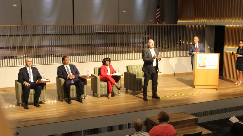 At a recent candidate forum, Dayton City Commission candidates said they believe the Aug. 28 shooting of Javier Harrison and Devin Henderson was murder. Candidates, from left, are Commissioners Matt Joseph and Chris Shaw and challengers Shenise Turner-Sloss and David Esrati. CORNELIUS FROLIK / STAFF
