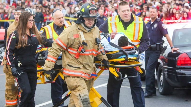 State and local emergency response agencies will conduct a mass-fatality exercise Friday similar to this mock crash exercise last month at Fairfield High School. GREG LYNCH / STAFF