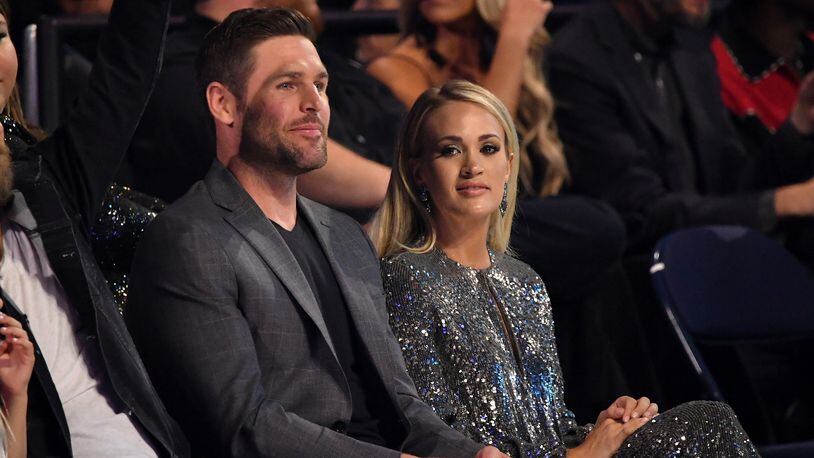 NASHVILLE, TN - JUNE 06:  Mike Fisher and Carrie Underwood attend the 2018 CMT Music Awards at Bridgestone Arena on June 6, 2018 in Nashville, Tennessee.  (Photo by Mike Coppola/Getty Images for CMT)