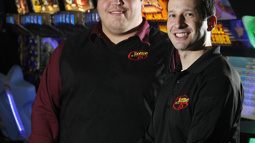 Stevie Baia, general manager, left, and Jonah Sandler, chief executive of Scene75 Entertainment Center, in a 2014 photo. LISA POWELL / STAFF