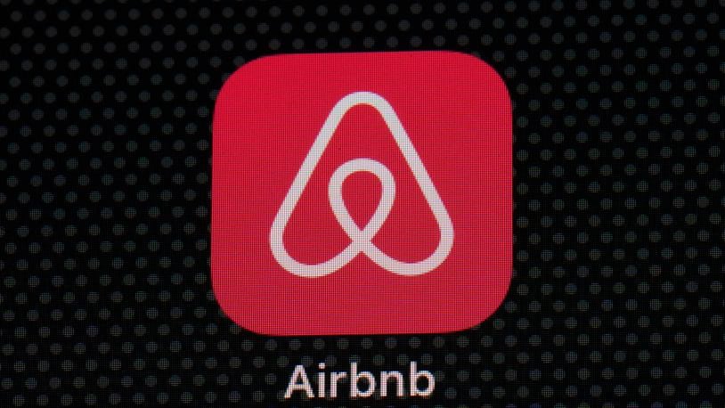 FILE - The Airbnb app icon is seen on an iPad screen on May 8, 2021, in Washington. Airbnb reports earnings on Wednesday, April 8, 2024. (AP Photo/Patrick Semansky, File)