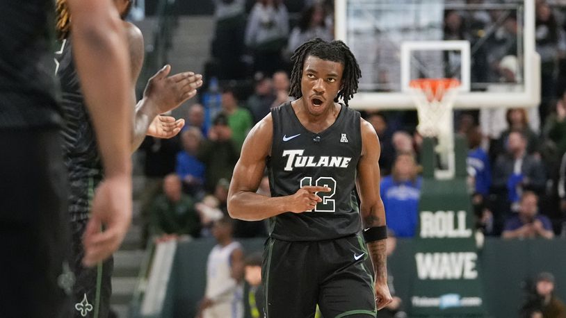 Tulane guard Kolby King (12) reacts during the second half of an NCAA college basketball game against Memphis in New Orleans, Sunday, Jan. 21, 2024. Tulane won 81-79. (AP Photo/Gerald Herbert)