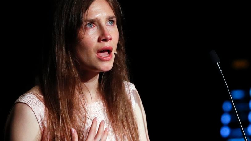 FILE - In this June 15, 2019 file photo, Amanda Knox gets emotional as she speaks at a Criminal Justice Festival at the University of Modena, Italy. Knox will appear Feb. 29 at the Schuster Center. (AP Photo/Antonio Calanni, File)