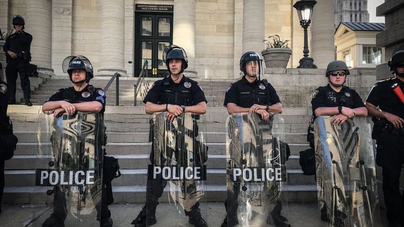 Dayton police at Courthouse Square, just before the 7 p.m. on May 31, 2020. JIM NOELKER / STAFF