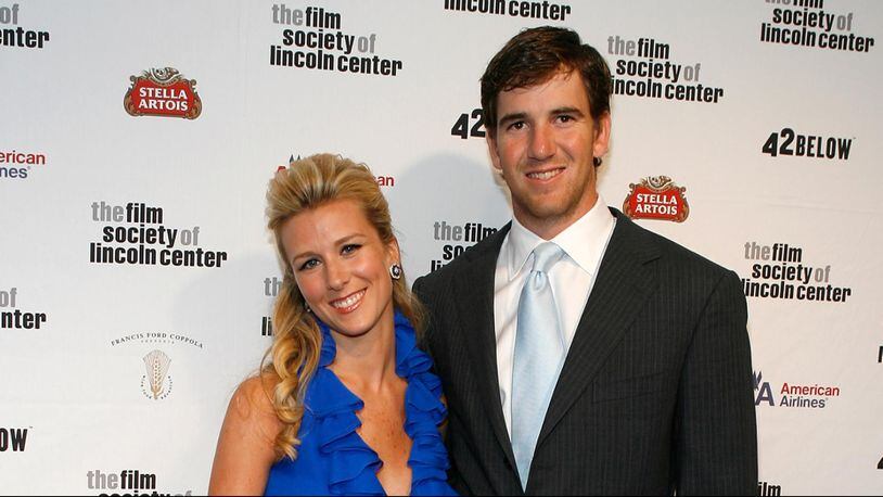 Abby McGrew and football player Eli Manning pictured in 2009. The couple reportedly welcomed their fourth child Super Bowl Sunday 2018.