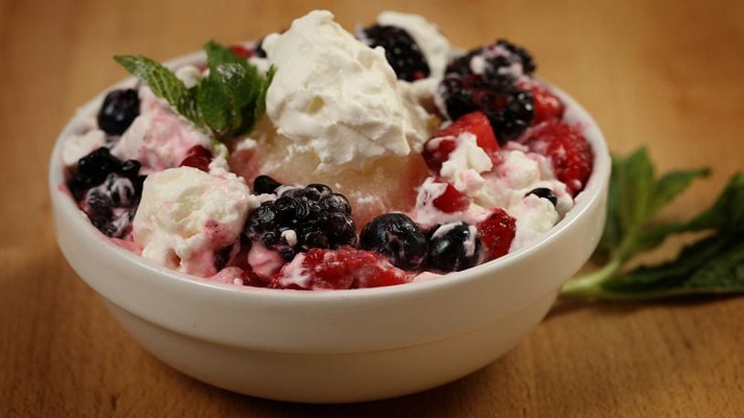 Eton mess, the summer treat mix of broken up meringue pieces and smashed berries stirred into sweetened whipped cream, gets a boost in this version with homemade lemon sorbet. (E. Jason Wambsgans/Chicago Tribune/TNS) Shannon Kinsella / food styling)
