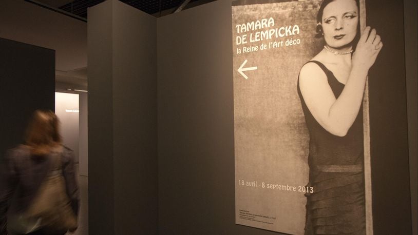 An exterior view of a sign featuring a photo of artist Tamara de Lempicka at the 'Tamara de Lempicka, Queen of the Art Deco' exhibition opening at La Pinacotheque on April 17, 2013 in Paris, France.