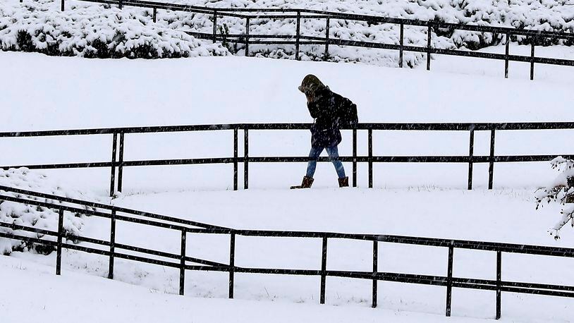 A Wiittenberg University student walk across campus in the snow last year. Bill Lackey/Staff