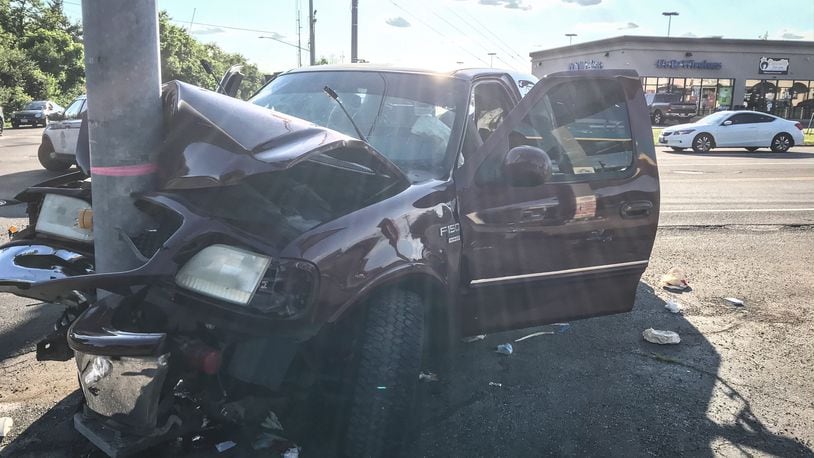 A pickup truck slammed into a pole at the intersection of Philadelphia Drive and West Siebenthaler Avenue Friday, June 12, 2020, in Dayton. JIM NOELKER / STAFF