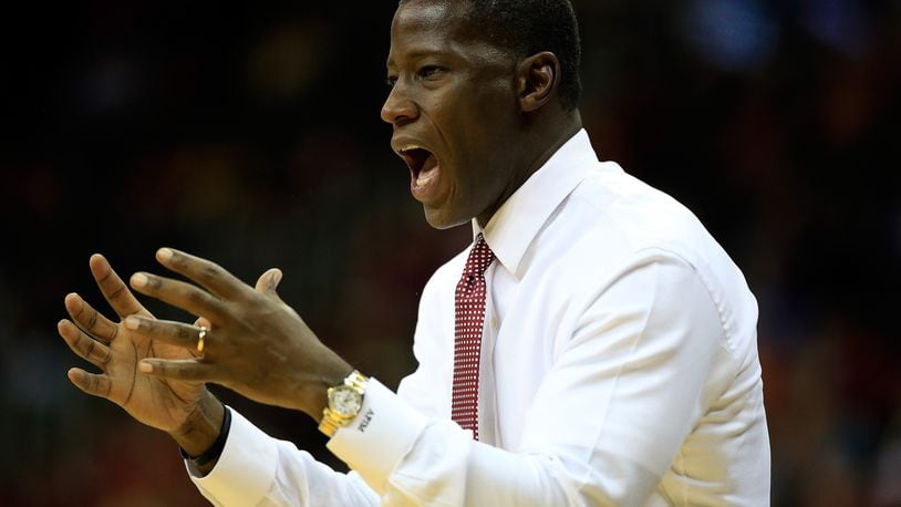 KANSAS CITY, MO - NOVEMBER 25: Head coach Anthony Grant of the Alabama Crimson Tide coaches from the bench during the CBE Hall Of Fame Classic consolation game against the Arizona State Sun Devils at Sprint Center on November 25, 2014 in Kansas City, Missouri. (Photo by Jamie Squire/Getty Images)