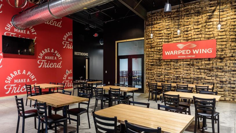 Look inside the new Warped Wing Brewery & Smokery, located at 6602 Executive Boulevard in Huber Heights near the Rose Music Center. The Huber Heights brewery will be Warped Wing’s fourth location. TOM GILLIAM / CONTRIBUTING PHOTOGRAPHER