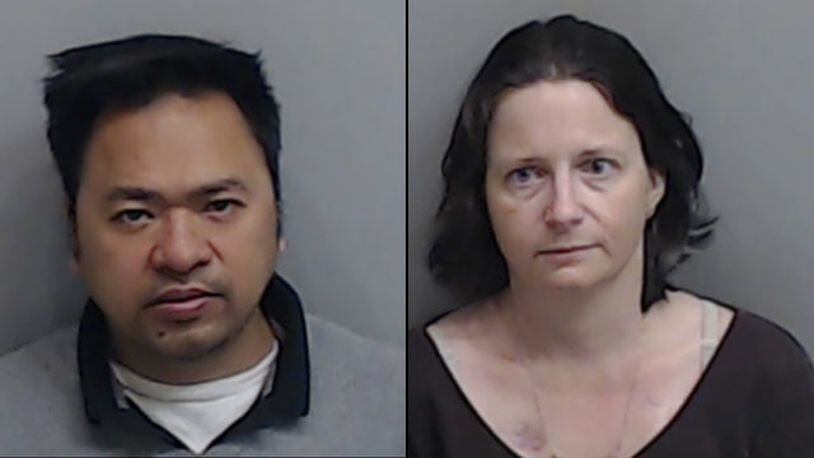 Lark and Jennifer Bui face child cruelty charges for alleged abuse of their daughter. (Photo: Roswell Police Department)