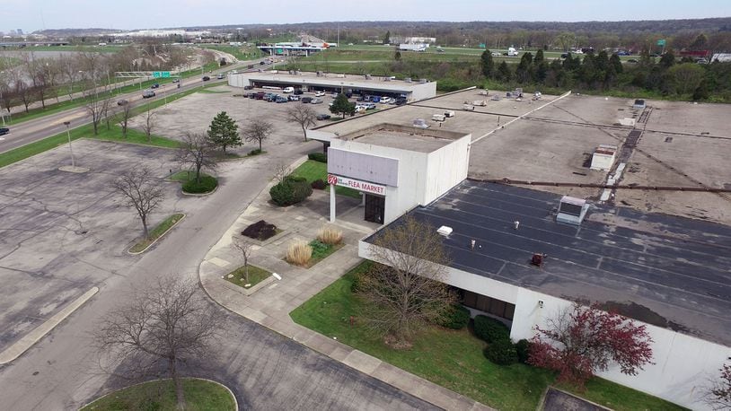 West Carrollton has hired an engineering firm to oversee the tearing down of structures – including the former Roberds site - on the 13.75 acres the city bought last year as part of a $3.2 million project near the Great Miami River. TY GREENLEES / STAFF