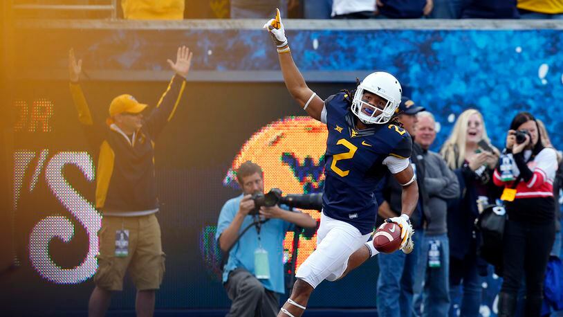 MORGANTOWN, WV - NOVEMBER 04: Ka’Raun White #2 of the West Virginia Mountaineers celebrates after catching a touchdown pass that was later challenged and overturned in the first half against the Iowa State Cyclones at Mountaineer Field on November 04, 2017 in Morgantown, West Virginia. (Photo by Justin K. Aller/Getty Images)