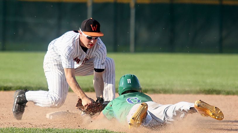Waynesville shortstop Kyle Leis tags out Chaminade Julienne’s Darian Jones during their Division II regional semifinal at Mason on Friday. CONTRIBUTED PHOTO BY E.L. HUBBARD