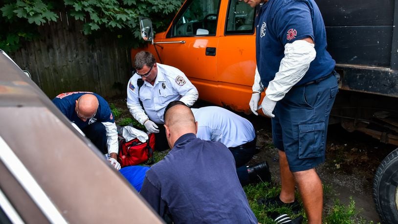 The heroin/opioid epidemic has cost Middletown taxpayers more than $2.3 million in 2017. Middletown paramedics and police officers responded to a drug overdose behind the Midd-Town Carry Out on Central Avenue Monday, June 26 in Middletown. Emergency personnel found a man unconscious, lying between two vehicles across the alley. Paramedics first tried to start an IV, the fastest and most effective way to push Narcan into the mans system, and when that failed, Narcan was administered through the mans nose. Then a second IV was started. The entire time, paramedics bagged the gentleman until his oxygen level returned to normal. Two doses of Narcan, twice the normal amount, were used to revive the man, who was transported to Atrium. FILE PHOTO