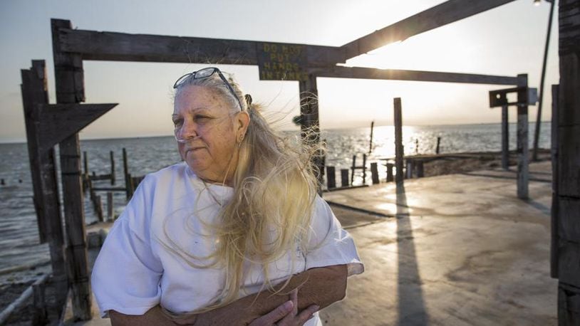 Mary Ann Heiman purchased windstorm insurance for her property along the causeway between Aransas Pass and Port Aransas, believing her business was covered when Hurricane Harvey destroyed the property. However, later, when she placed a claim with the Texas Windstorm Insurance Association (TWIA), she was denied citing an inverted address number. Heiman stands on the concrete platform where the business once stood, on Thursday April 20, 2018, in Port Aransas, TX.
