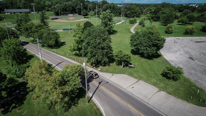 A man was found dead in the parking lot of Dayton's Triangle Park around midnight on July 28, 2022. Another was arrested and booked into the Montgomery County Jail on preliminary murder charges. | JIM NOELKER/STAFF