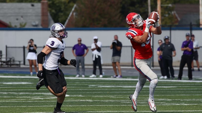Dayton's Jake Coleman makes a catch against St. Thomas in the final minutes on Saturday, Sept. 30, 2023, at Welcome Stadium. David Jablonski/Staff