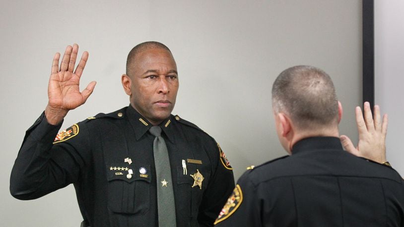 Montgomery County Sheriff’s Office Maj. Daryl Wilson was sworn in Tuesday as chief deputy by new Sheriff Rob Streck. CHRIS STEWART / STAFF