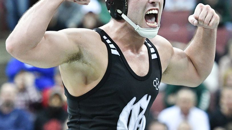 Graham’s Kavan Sarver celebrates after winning the 195-pound Division II state title on Saturday at Value City Arena. BRYANT BILLING / CONTRIBUTED