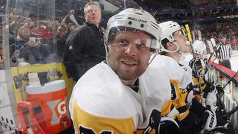 Phil Kessel #81 of the Pittsburgh Penguins watches from the bench during the first period against the New Jersey Devils at the Prudential Center on February 19, 2019 in Newark, New Jersey.