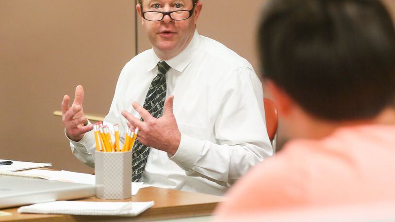 Ross Schools superintendent Scott Gates talks with students in his Superintendent Student Advisory Council during a meeting at Ross Middle School, Wednesday, May 10, 2017. GREG LYNCH / STAFF