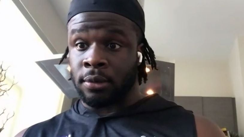 In this photo taken from video, Minnesota Vikings NFL football team defensive end Ifeadi Odenigbo talks on a conference call from his home in Chicago, Thursday, May 21, 2020. Odenigbo’s progression from the practice squad accelerated last season with regular playing time and made an even bigger leap forward this spring when stalwart Everson Griffen did not re-sign with the team. (Dave Campbell via Zoom)