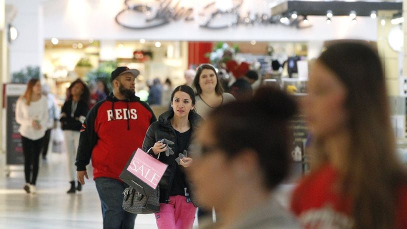 The Dayton Mall was busy on Tuesday afternoon. Shoppers have flooded area stores and malls returning unwanted gifts they received this holiday season. Most stores have made it an easy task, but others have made it difficult for a reason. According to the National Retail Federation’s latest Return Fraud Survey, retailers estimate that 3.5 percent of their holiday returns this year will be fraudulent, up slightly from the estimated 3 percent reported last year. Holiday return fraud is expected to cost retailers $2.2 billion, up from approximately $1.9 billion last year.. TY GREENLEES / STAFF